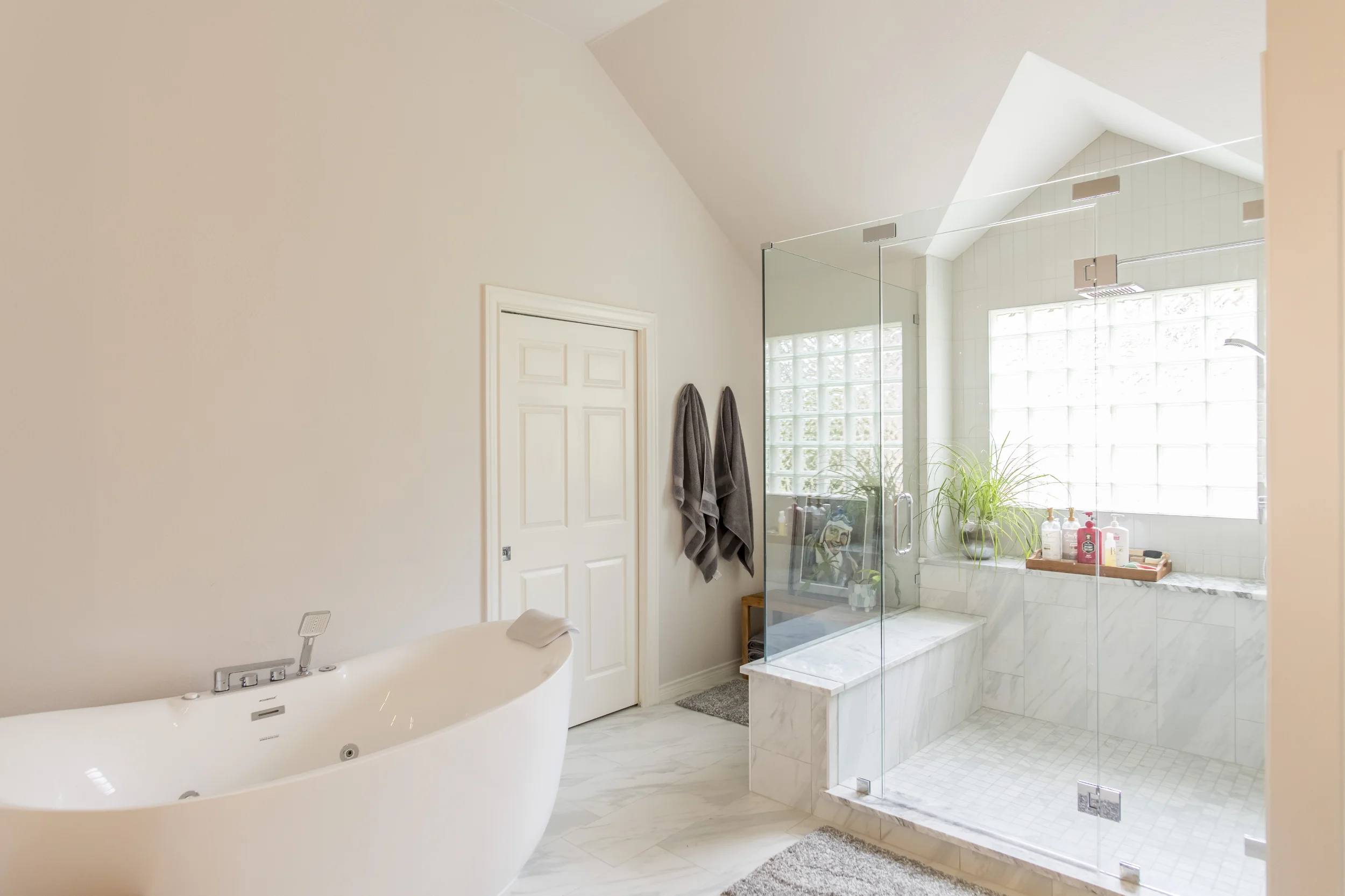 Walk-in shower and freestanding tub